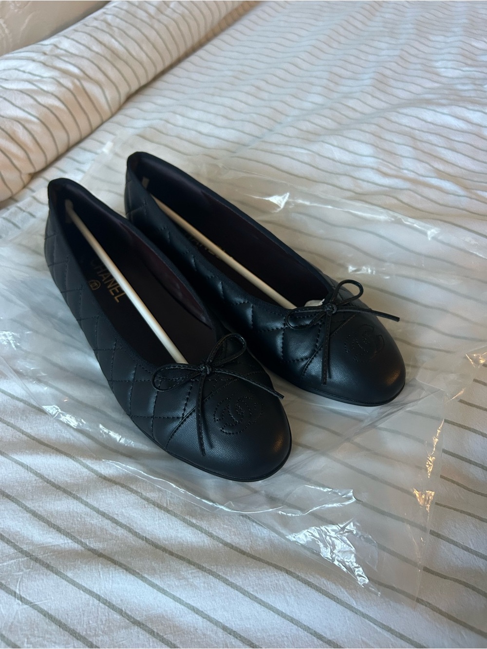 CHANEL Black Quilted Leather Ballet Flats with Bow